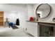 Bright and spacious basement with a bar area, recreational space, and storage shelving at 978 Mercury Cir, Lone Tree, CO 80124