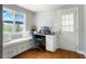 Bright office space with a built-in window bench, a door to outside, and hardwood floors at 978 Mercury Cir, Lone Tree, CO 80124