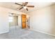 Bedroom featuring a sliding door closet and a doorway to the kitchen at 155 S Pennsylvania St # 311, Denver, CO 80209