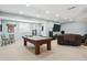 Finished basement featuring a pool table, chairs, window, and an entertainment area at 10029 Winterthur Ct, Highlands Ranch, CO 80129
