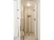 Modern bathroom featuring white tiled walls and glass shower at 2100 16Th St # 405, Denver, CO 80202