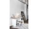Cozy home office featuring a desk, bench, and decorative mirror at 2100 16Th St # 405, Denver, CO 80202
