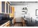 Kitchen features stainless steel appliances, sleek black countertops and open shelving for storage at 2100 16Th St # 405, Denver, CO 80202