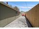 Spacious backyard with a concrete patio, perfect for outdoor activities and relaxation at 3420 Julian St, Denver, CO 80211