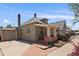 Charming exterior showcasing a well-maintained lawn and attractive landscaping at 3420 Julian St, Denver, CO 80211