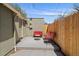 Private patio area, perfect for outdoor entertaining or relaxing, surrounded by a wood fence at 3420 Julian St, Denver, CO 80211