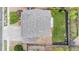 Aerial view of a single Gathering home showing the roof and lawn at 10158 Granby St, Commerce City, CO 80022