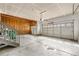 Two-car garage with unfinished drywall and storage possibilities at 10158 Granby St, Commerce City, CO 80022