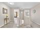 Upstairs hallway with neutral carpet and paint, offering a bright and welcoming transition space at 10158 Granby St, Commerce City, CO 80022
