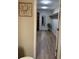 Spacious walk-in closet with hardwood floors, shelving, and ample storage space at 10158 Granby St, Commerce City, CO 80022