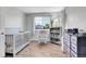 Neutral Bedroom with hardwood floors, natural light, and calming decor at 10521 Taylor Ave, Firestone, CO 80504
