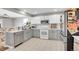 Spacious kitchen featuring stainless appliances, and a view into the dining area at 10521 Taylor Ave, Firestone, CO 80504