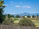 This property enjoys an open view of the mountains in the distance at 10521 Taylor Ave, Firestone, CO 80504
