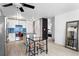 Bright kitchen space with stainless appliances, adjacent dining, and access to additional living areas at 1121 Albion St # 210, Denver, CO 80220