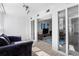 Bright open concept living room leading to additional rooms at 1121 Albion St # 210, Denver, CO 80220