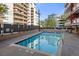 Inviting community pool surrounded by apartment buildings, offering a relaxing outdoor space at 1121 Albion St # 210, Denver, CO 80220
