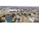 Aerial view of the neighborhood and surrounding community with mature trees and residential homes at 4231 S Quemoy Ct, Aurora, CO 80018