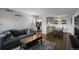 Open concept living room and dining area with hardwood floors at 519 Wright St # 108, Lakewood, CO 80228