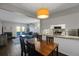 Living and dining room area showing lots of natural light from the sliding doors and windows at 519 Wright St # 108, Lakewood, CO 80228