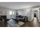 Cozy living room with fireplace and access to outdoor patio at 519 Wright St # 108, Lakewood, CO 80228