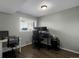 Bright office space with hardwood floors, large window, and ample room for desks and computer setups at 519 Wright St # 108, Lakewood, CO 80228