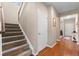 Carpeted staircase leading to the upper level at 40 Ferris Ln, Erie, CO 80516