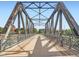 Steel bridge provides a unique architectural element with pedestrian walkway and open sky at 1401 Wewatta St # 308, Denver, CO 80202