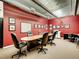 Spacious conference room with large table, chairs, and modern decor, designed for collaborative meetings at 1401 Wewatta St # 308, Denver, CO 80202
