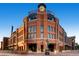 Exterior of Coors Field with a statue and planters, showcasing the baseball stadium's entrance and details at 1401 Wewatta St # 308, Denver, CO 80202