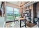 Stylish office boasts natural light, rustic wood wall, and striking antler chandelier at 1401 Wewatta St # 308, Denver, CO 80202