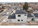 New construction home aerial view, showcasing the exterior and surrounding neighborhood at 3226 W Dakota Ave, Denver, CO 80219