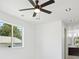 Bright bedroom with neutral walls, ceiling fan, recessed lighting, and an ensuite bathroom at 3226 W Dakota Ave, Denver, CO 80219