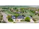 Stunning aerial view of a residential neighborhood with well-manicured lawns, mature trees, and diverse architectural styles at 14833 Vine St, Thornton, CO 80602