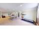 Spacious finished basement featuring game area with ping pong table, treadmill, and seating at 14833 Vine St, Thornton, CO 80602