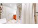 The bathroom features a wood vanity with granite countertop and a shower-tub combo at 14833 Vine St, Thornton, CO 80602