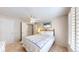 Comfortable bedroom features a ceiling fan and neutral decor at 14833 Vine St, Thornton, CO 80602