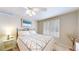 Cozy bedroom with a ceiling fan and comfortable bedding for a relaxing atmosphere at 14833 Vine St, Thornton, CO 80602