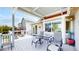 Relaxing covered deck with comfortable seating, perfect for outdoor entertaining and enjoying the surrounding views at 14833 Vine St, Thornton, CO 80602