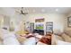 The bright and airy living room offers hardwood floors, a vaulted ceiling, and comfortable seating for Gathering and guests at 14833 Vine St, Thornton, CO 80602