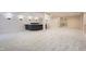 Open basement featuring a bar, offering ample space for gatherings and customization at 22019 E Arbor Dr, Aurora, CO 80016