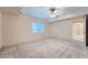 Inviting bedroom with soft carpet and a window providing ample natural light at 22019 E Arbor Dr, Aurora, CO 80016