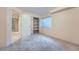 Comfortable bedroom with neutral colors, a closet, and a window for natural light at 22019 E Arbor Dr, Aurora, CO 80016