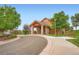 Beautiful clubhouse featuring stone accents and a covered entryway at 22019 E Arbor Dr, Aurora, CO 80016