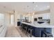 Spacious kitchen with a large island, modern appliances, and pendant lighting at 22019 E Arbor Dr, Aurora, CO 80016
