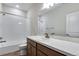 Bathroom featuring a tub and shower combo, and a single sink at 9972 Wheeling St, Commerce City, CO 80022