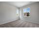 Bedroom featuring multiple windows allowing natural light and plush carpet at 9972 Wheeling St, Commerce City, CO 80022