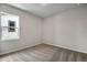 Neutral bedroom features carpet flooring and a window at 9972 Wheeling St, Commerce City, CO 80022