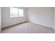 Bedroom featuring neutral walls and plush carpet at 9005 E Lehigh Ave # 16, Denver, CO 80237