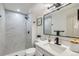 Updated bathroom with marble tile shower and modern vanity at 5721 W 92Nd Ave # 96, Westminster, CO 80031