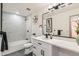 Clean bathroom with tub and shower, modern vanity and fixtures, and tiled walls at 5721 W 92Nd Ave # 96, Westminster, CO 80031